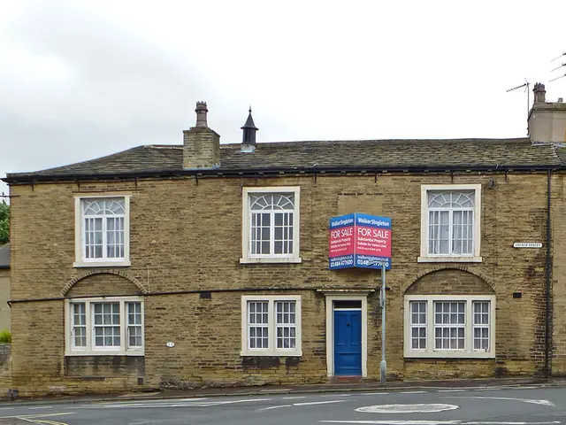 There is a road at the bottom of this image and there is a house in the background and the sky is...