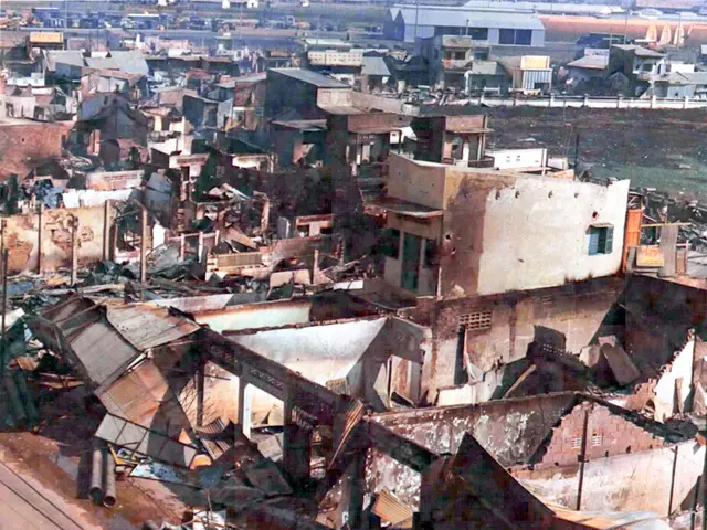 This picture shows few buildings and we see few collapsed buildings.