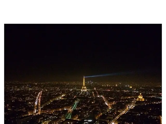 In the picture I can see few buildings which has few lights on it.