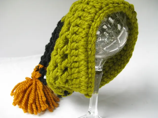 Here in this picture we can see a table present, on which we can see a glass covered with a woolen...